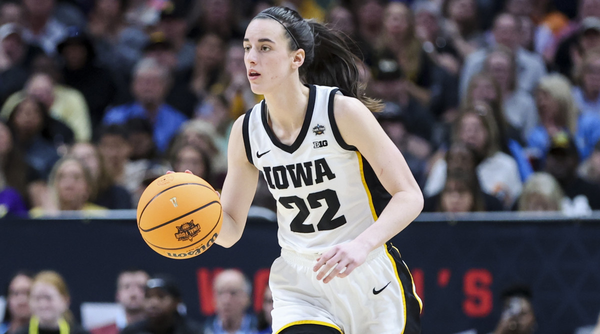 Iowa guard Caitlin Clark dribbles during NCAA women’s basketball championship against LSU